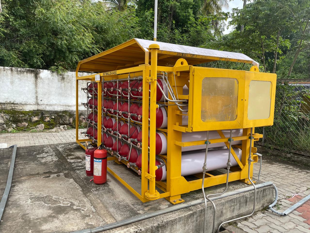 Technicians operating plant control room equipment
