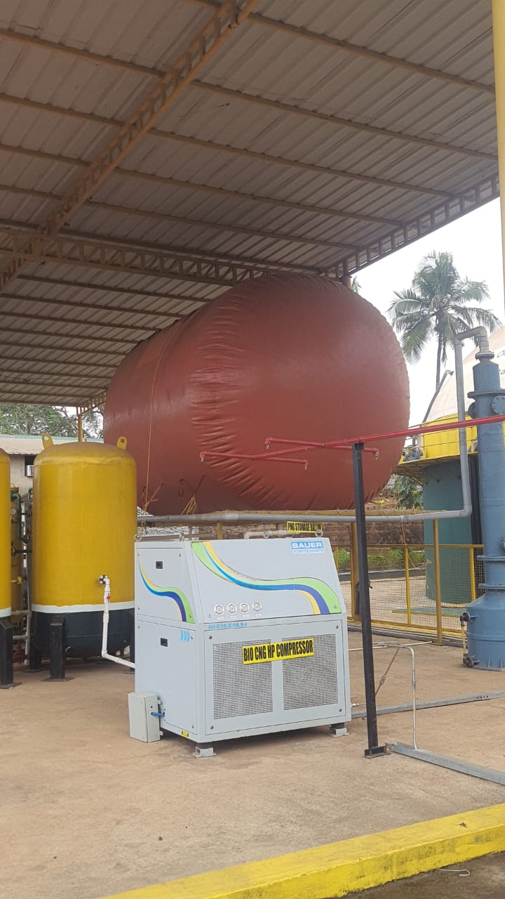 Aerial view of a power plant with storage tanks